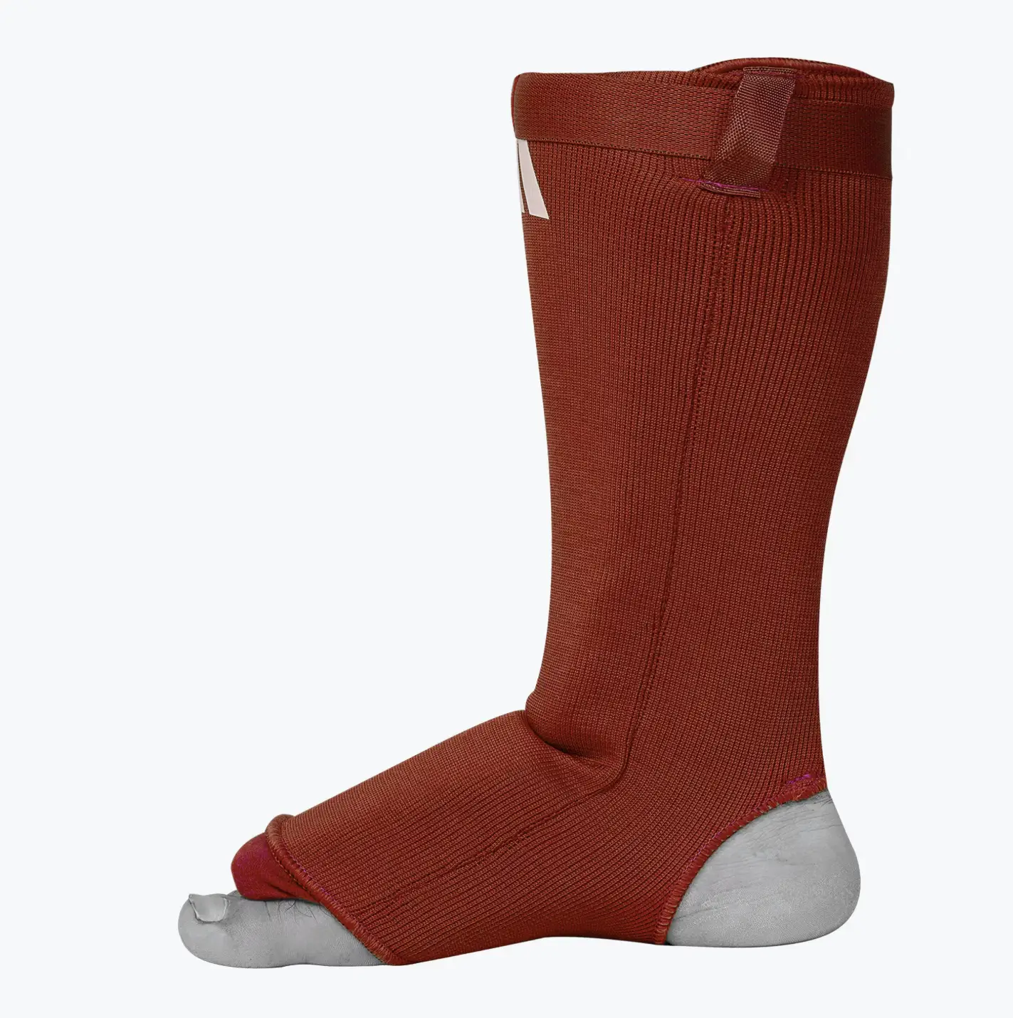 Détails matière protège tibia Adidas rouge tissu élastique