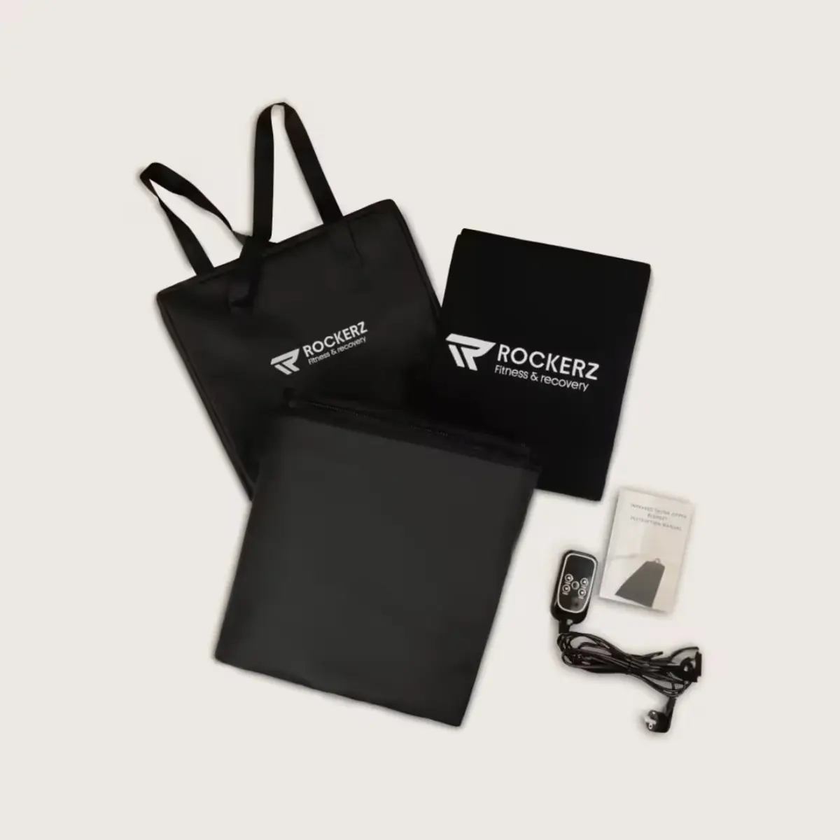 Contenu de la couverture sauna infrarouge Rockerz : télécommande et sac de rangement