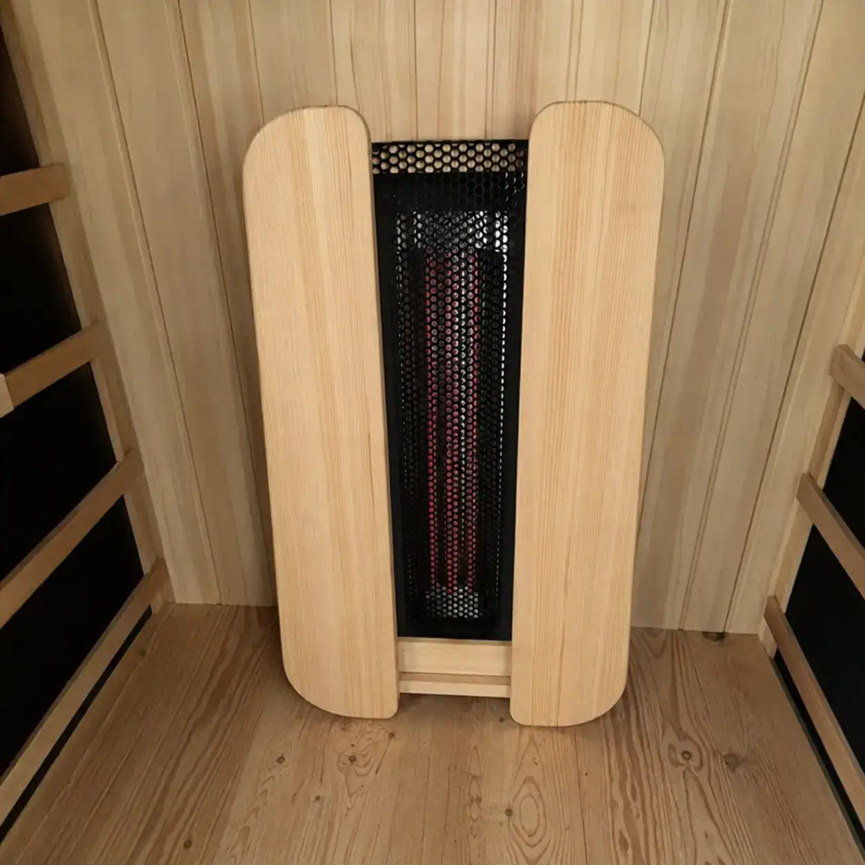 Détail du chauffage quartz d'un sauna infrarouge en épicéa